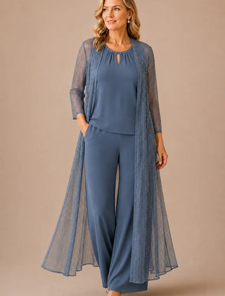 Sheer duster formal pant suit by THE WHITMORE FAMILY, in dusty blue, styled as a stylish dress with tailored pants and elegant layers