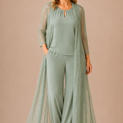 Sheer duster formal pant suit by THE WHITMORE FAMILY, featuring a dusty sage dress with elegant, flowing fabric and tailored design.