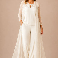 White sheer duster formal pant suit dress by THE WHITMORE FAMILY, featuring elegant design and tailored fit for special occasions.