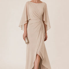 Dark navy chiffon cape sleeve wrap formal dress with brooch by THE WHITMORE FAMILY, elegant and flowing for special occasions.