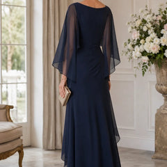 Dark navy chiffon cape sleeve wrap formal dress by THE WHITMORE FAMILY with brooch, elegant and flowing for special occasions.
