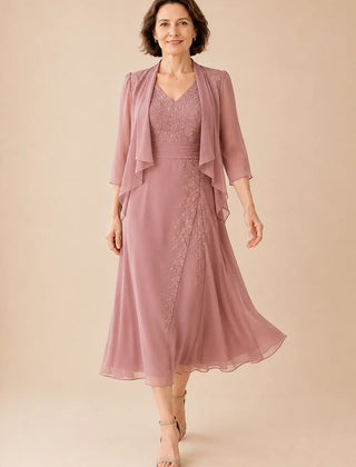 Dusty rose V-neck chiffon midi dress with lace detail by THE WHITMORE FAMILY, stylish and elegant for special occasions.