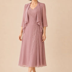 V neck chiffon midi dress with lace detail by THE WHITMORE FAMILY, shown from the side view. Elegant mother-of-the-bride dress.