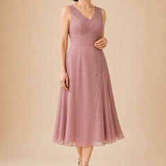 V neck chiffon midi dress with lace detail by THE WHITMORE FAMILY, featuring elegant fabric and intricate lace accents.