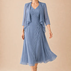 Shadowarth Belle dusty blue V neck chiffon midi dress with lace detail, elegant mother-of-the-bride dress by THE WHITMORE FAMILY.