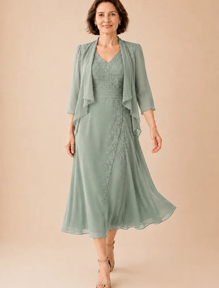 V-neck chiffon midi dress with lace detail in dusty sage, designed by THE WHITMORE FAMILY, elegant and flowy for special occasions.