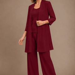 Gray Evelyn embroidered three-piece pant set by THE WHITMORE FAMILY, featuring a stylish dress with intricate embroidery.