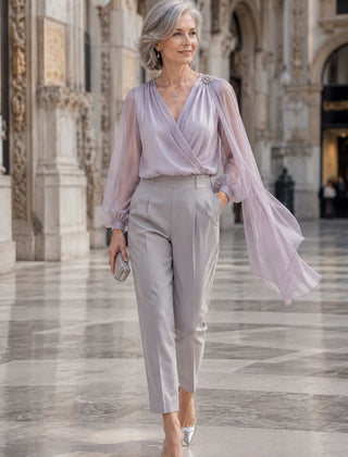 Lilac chiffon cape blouse by THE WHITMORE FAMILY, elegant dress with flowing cape detail perfect for wedding guests.