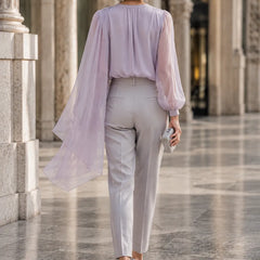 Lilac chiffon cape blouse by THE WHITMORE FAMILY, elegant wedding guest dress with flowing chiffon fabric and stylish back design.