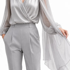 Elegant silver chiffon cape blouse by THE WHITMORE FAMILY, featuring a romantic design perfect for wedding guest dress attire.