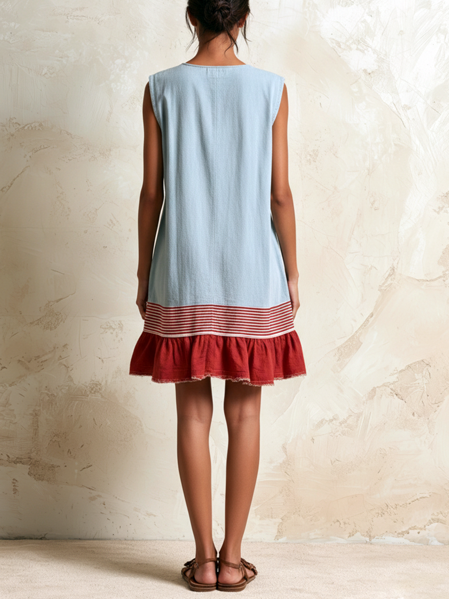 Hazel™ Ruffle Hem Tunic Dress by THE WHITMORE FAMILY, featuring a flowy silhouette with ruffle hem detail, in a soft fabric.