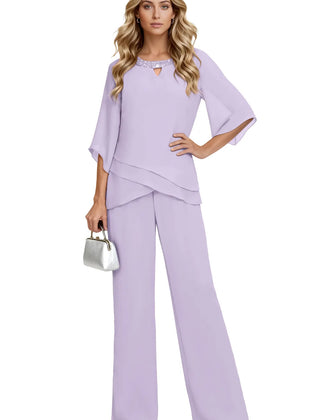 Sophisticated loose-fit formal pant dress set by THE WHITMORE FAMILY in lilac chiffon with elegant draping and tailored fit.