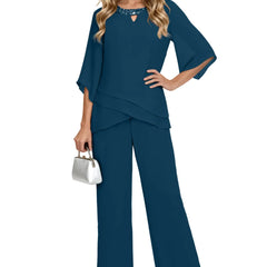 Sophisticated loose-fit formal pant dress set by THE WHITMORE FAMILY featuring chiffon fabric and elegant peacock color.