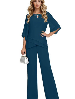 Sophisticated loose-fit formal pant dress set by THE WHITMORE FAMILY featuring chiffon fabric and elegant peacock color.
