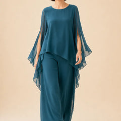 Flowing chiffon overlay mother of the bride pant set by THE WHITMORE FAMILY, featuring elegant fabric and stylish design.