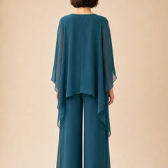 Flowing chiffon overlay mother of the bride pant set by THE WHITMORE FAMILY, elegant dress with flowing chiffon fabric.