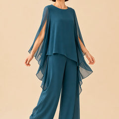 Flowing chiffon overlay mother of the bride pant set by THE WHITMORE FAMILY, featuring a stylish dress with elegant fabric and design.