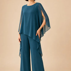 Flowing chiffon overlay mother of the bride pant set by THE WHITMORE FAMILY, featuring a stylish dress with elegant layers.