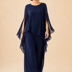 Flowing chiffon overlay mother of the bride pant set dress by THE WHITMORE FAMILY, featuring elegant design and comfortable fit.