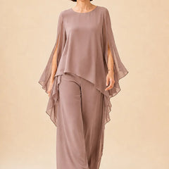 Flowing chiffon overlay mother of the bride pant set by THE WHITMORE FAMILY, featuring a stylish dress with elegant chiffon details.