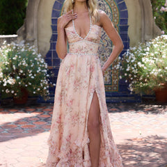 Pink Sofia elegant flowing dress by THE WHITMORE FAMILY, showcasing lightweight fabric and graceful design.