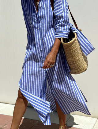 Pink Sophia striped shirt dress by THE WHITMORE FAMILY, featuring a classic design and comfortable fit, ideal for casual wear.