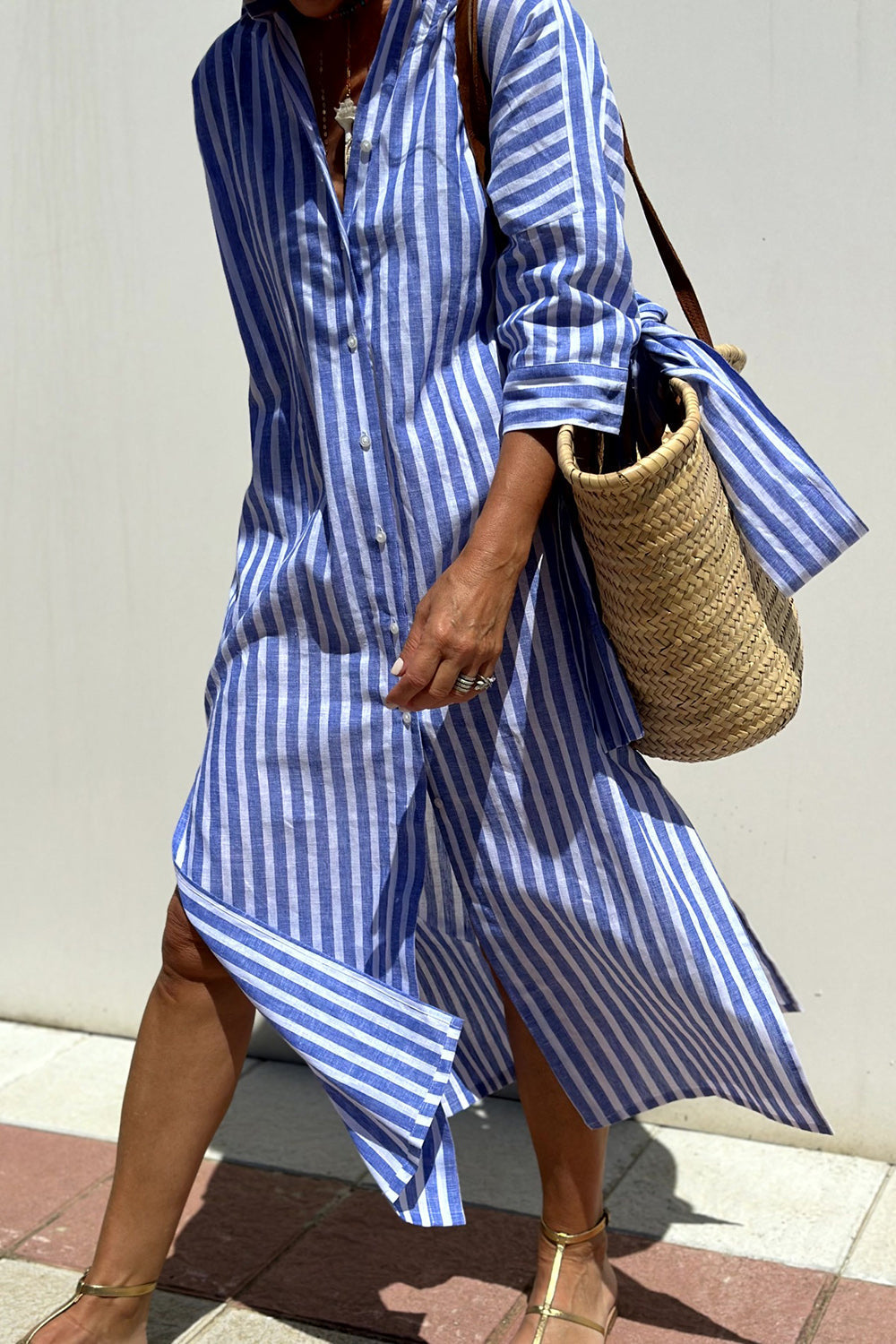 Pink Sophia striped shirt dress by THE WHITMORE FAMILY, featuring a classic design and comfortable fit, ideal for casual wear.