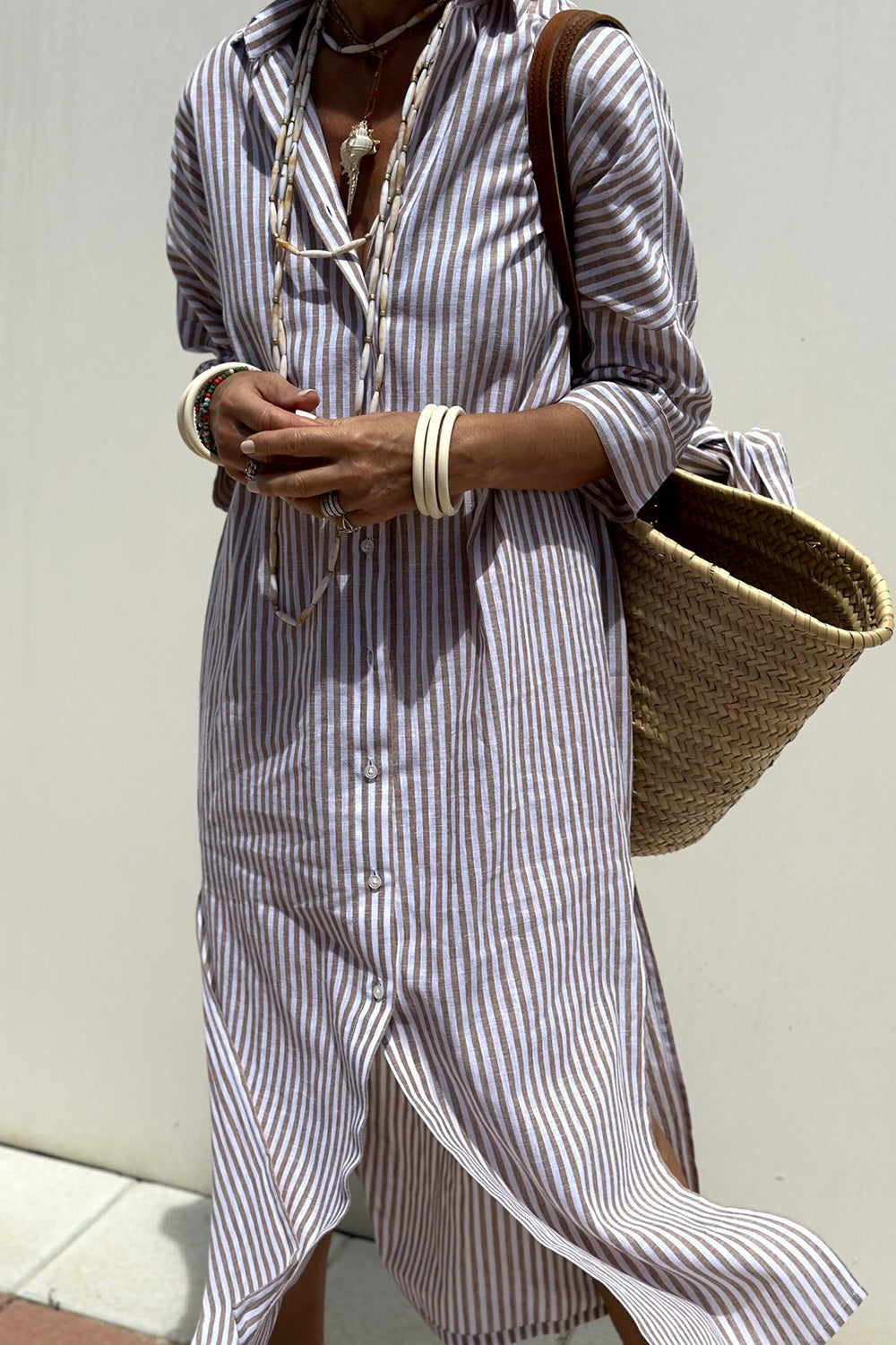Pink Sophia striped shirt dress by THE WHITMORE FAMILY, featuring a classic design with elegant comfort and tailored fit.