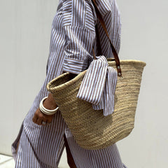 Pink Sophia striped shirt dress by THE WHITMORE FAMILY, featuring a classic design with elegant, comfortable fit.