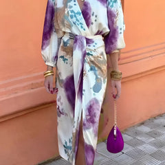 Elegant Lily summer dress by THE WHITMORE FAMILY, featuring lightweight fabric and floral design for stylish warm-weather wear.