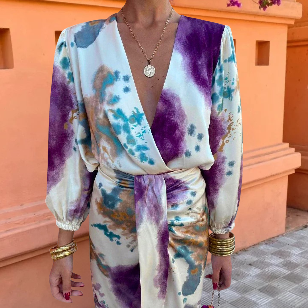 Elegant summer Lily dress by THE WHITMORE FAMILY featuring a flowy design and stylish look, perfect for warm weather occasions.