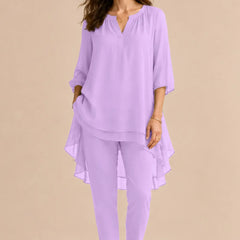 Seraphina Elegant Overlay Pant Ensemble dress by THE WHITMORE FAMILY, lilac color with stylish overlay details, perfect for special occasions.