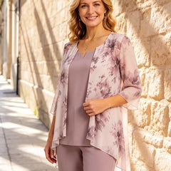 Floral chiffon three-piece pant suit by THE WHITMORE FAMILY, featuring a dress with matching pants and a floral pattern.