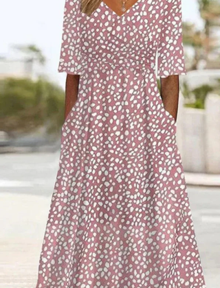 Women’s rose-colored Romy midi dress by THE WHITMORE FAMILY, featuring a tummy covering design and feminine style.