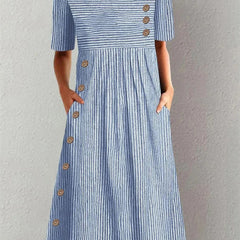 Women's Ashley midi striped dress by THE WHITMORE FAMILY, featuring a stylish midi length and classic striped pattern.