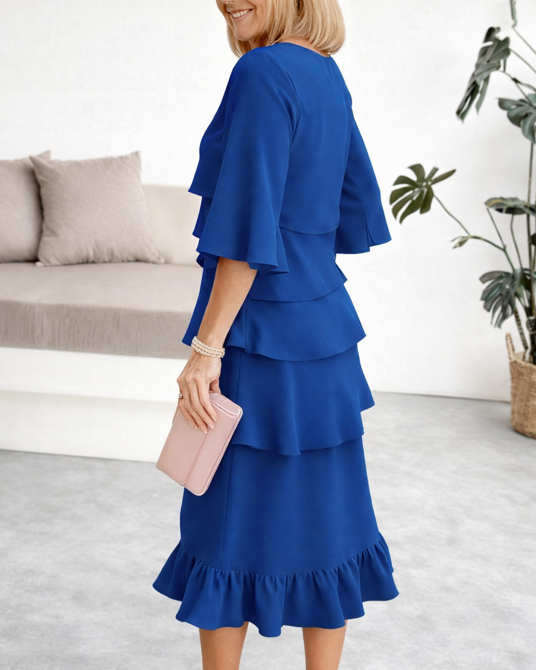 Black Patricia ruffle dress by THE WHITMORE FAMILY featuring elegant design and comfortable fit, perfect for stylish occasions.