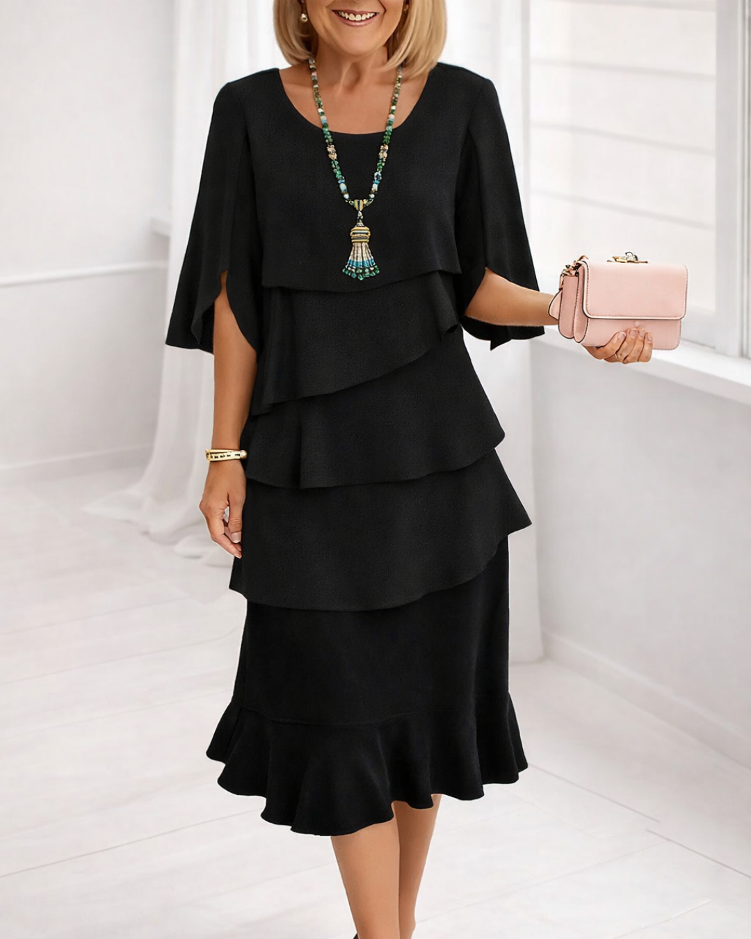 Black Patricia ruffle dress by THE WHITMORE FAMILY featuring elegant comfort and stylish design.