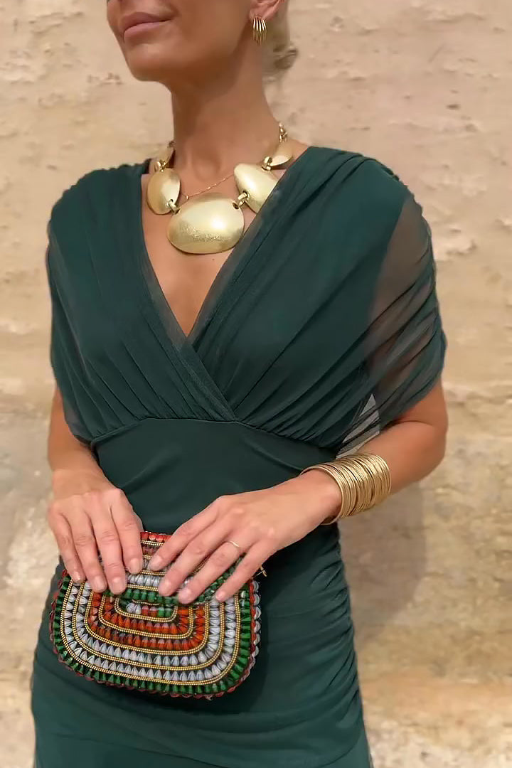 Bottle green Emma elegant maxi party dress by THE WHITMORE FAMILY, featuring a flowing silhouette and stylish design.