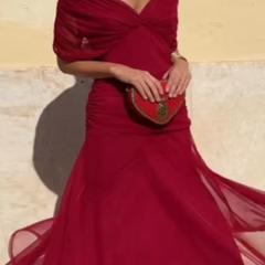 Bottle green Emma elegant maxi party dress by THE WHITMORE FAMILY, featuring a flowing silhouette and sophisticated design.