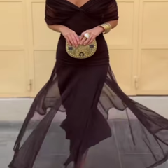 Bottle green Emma elegant maxi party dress by THE WHITMORE FAMILY, featuring a flowing design and sophisticated style.