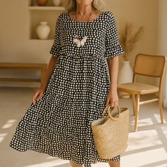 Brown Iris Sable Midi Dress by THE WHITMORE FAMILY, featuring a flowing silhouette and elegant design.