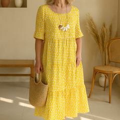 Brown Iris Sable Midi Dress by THE WHITMORE FAMILY featuring a flowing silhouette and elegant design, perfect for casual or formal wear.