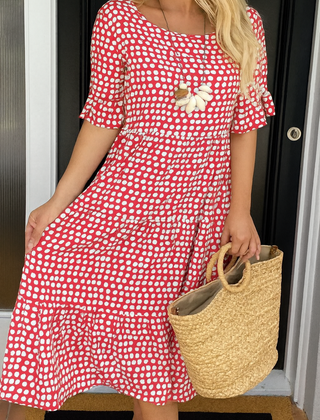 Brown Iris Sable Midi Dress by THE WHITMORE FAMILY, displayed on a mannequin, featuring a fitted waist and flowing skirt.