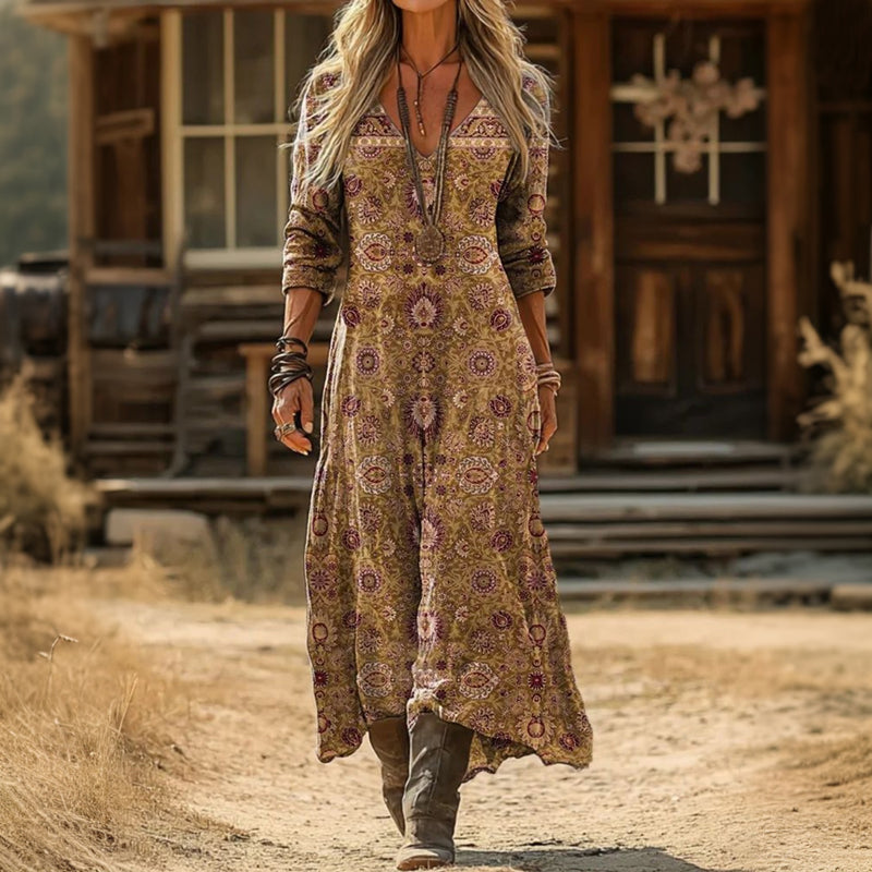 Multicolor Nicole bohemian style dress by THE WHITMORE FAMILY, relaxed fit with flowing fabric and vibrant pattern.