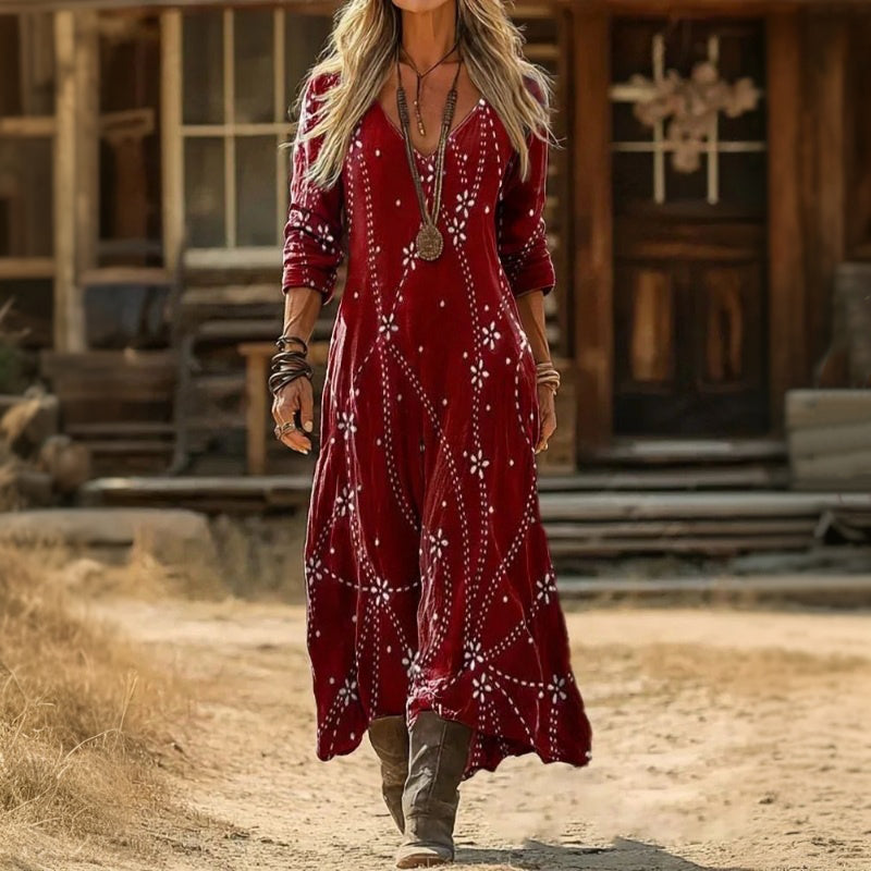 Red Erica dress by THE WHITMORE FAMILY with a soft, lightweight, flowy silhouette perfect for casual or special occasions.