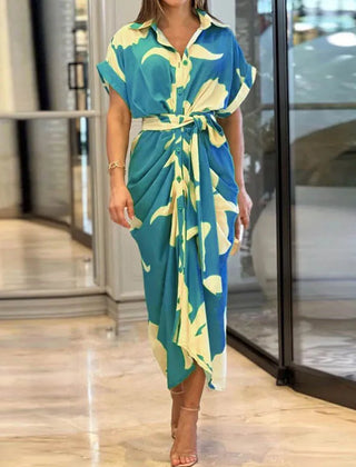 Green Tahlia elegant casual dress by THE WHITMORE FAMILY, featuring a flowing design and versatile style for everyday wear.