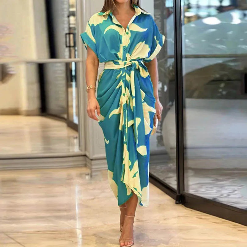 Green Tahlia elegant casual dress by THE WHITMORE FAMILY, featuring a flowing design and versatile style for everyday wear.