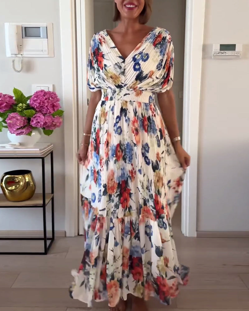 Elegant Florelle floral dress by THE WHITMORE FAMILY featuring a stylish design, perfect for special occasions.