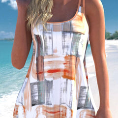 Dusty blue Paige Vibrant Floral Tankini Set by THE WHITMORE FAMILY, featuring a colorful floral pattern and supportive swim top.
