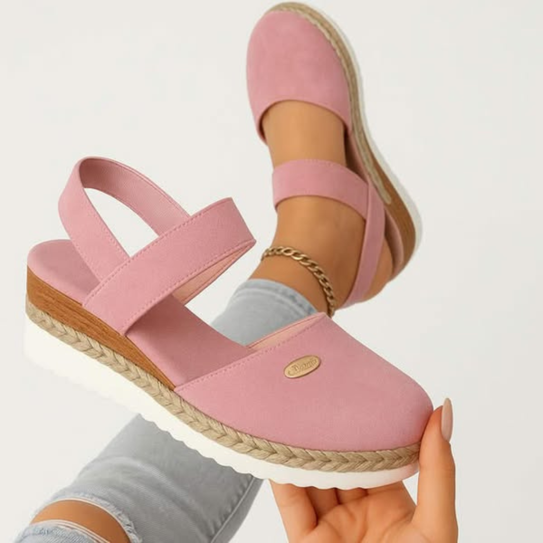 Beige Antonia™ ELUXOR orthopedic sandals by THE WHITMORE FAMILY, featuring supportive design and comfortable straps.